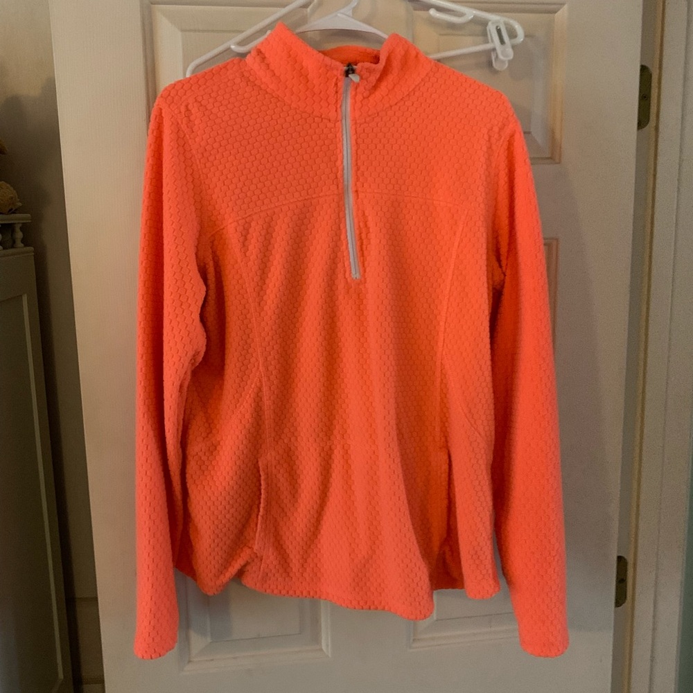 Bright orange quarter zip pullover